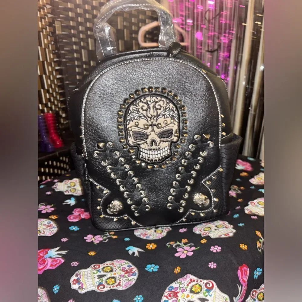 Edgy Backpack with Studded Skull Design